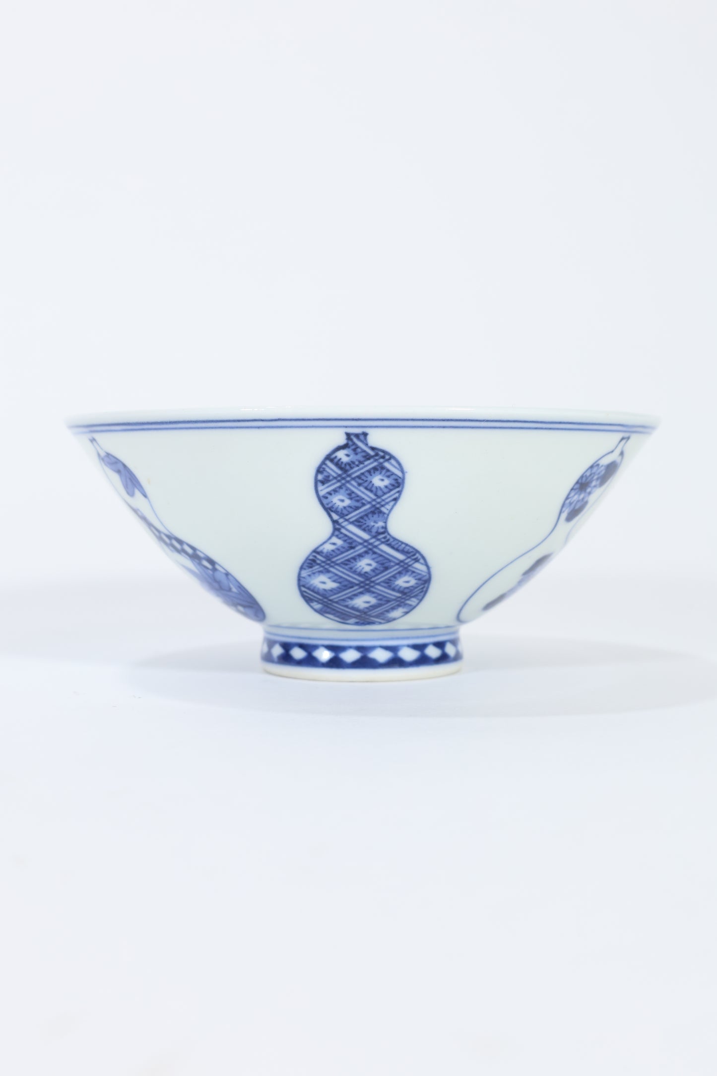 Blue and White Porcelain Bowl with Gourd Motif